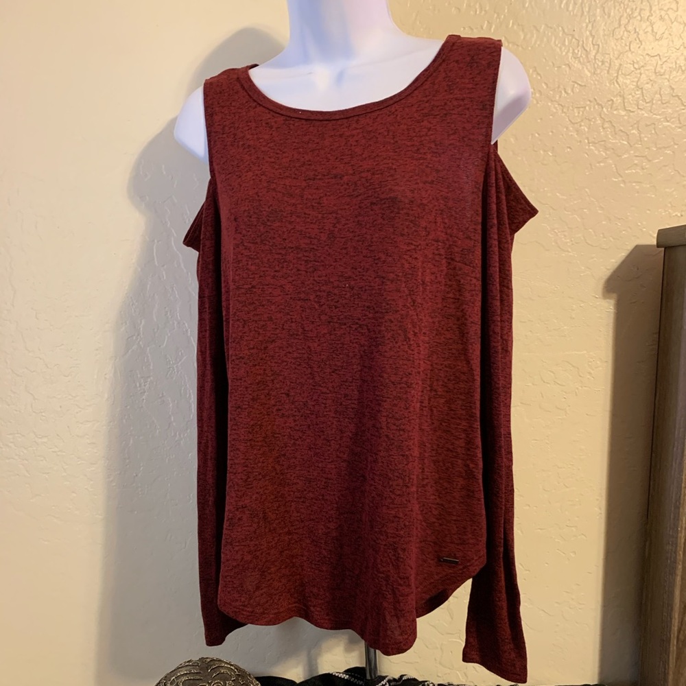 Red long sleeve shirt with shoulder cut outs